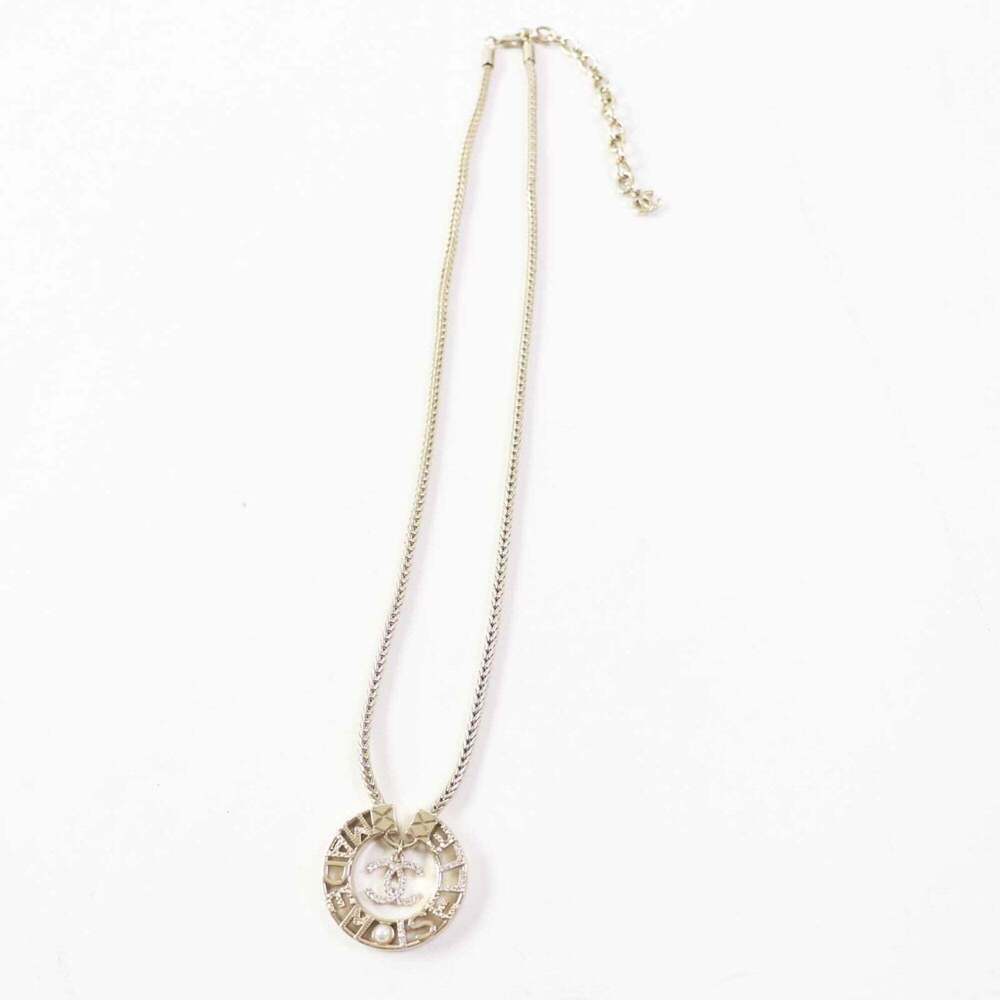 CHANEL Gold Logo Necklace - Picture 4 of 9